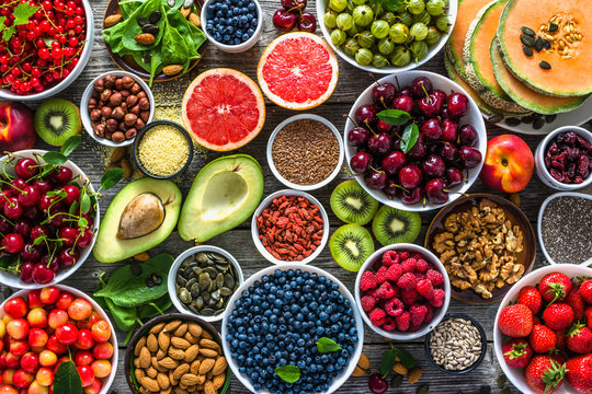 a colourful picture of superfoods that are good for you and your gut. consists of many small plates.