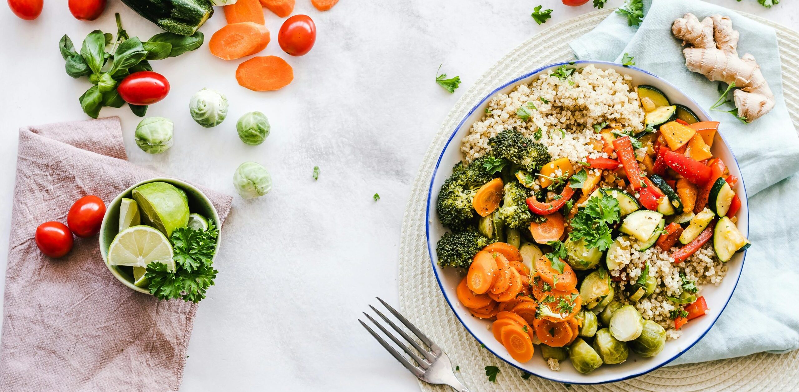 A plate of fresh salad featuring mixed greens, cherry tomatoes, cucumbers, and a light vinaigrette, showcasing a healthy and colorful meal.