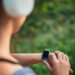 Timed workout with a woman looking at her watch.
