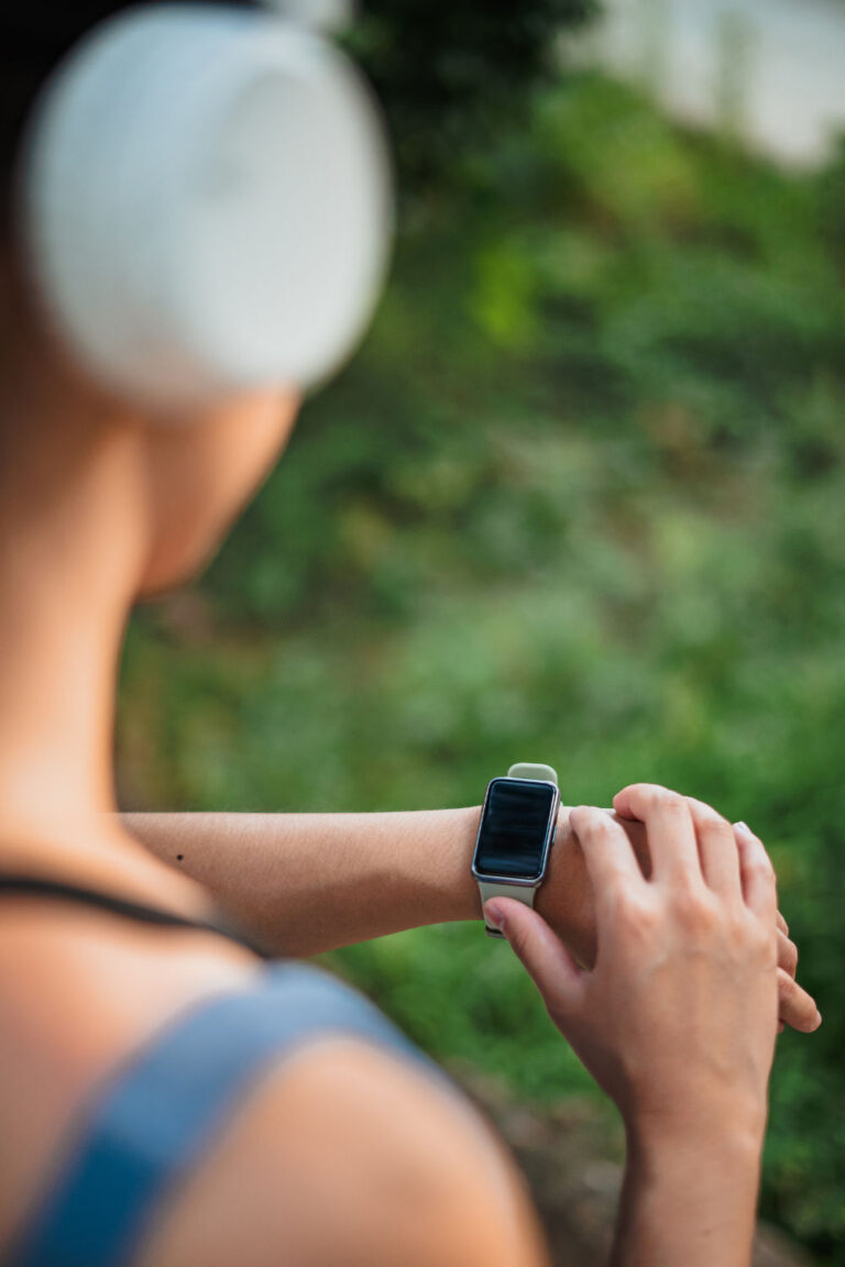 Timed workout with a woman looking at her watch.
