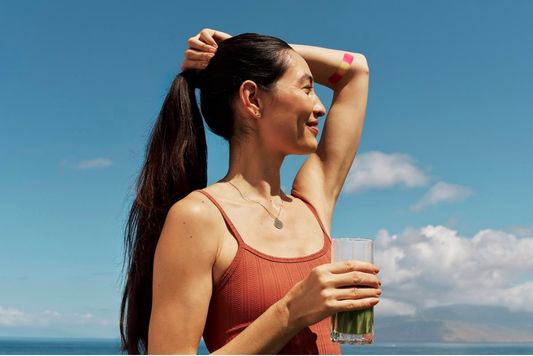 Girl drinking recovery supplement