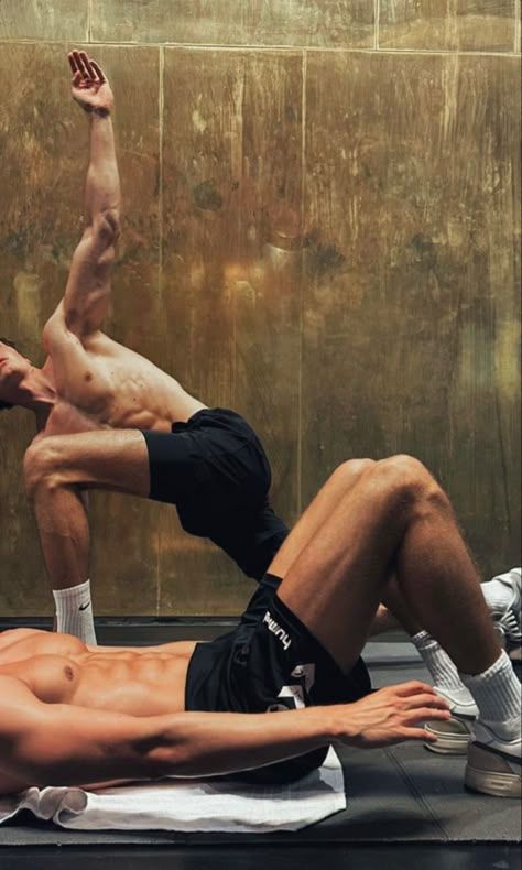 Men's workouts without weights. Two men working out.